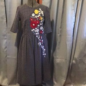eShakti size 4 navy dress with embroidered flowers cascading down front side.